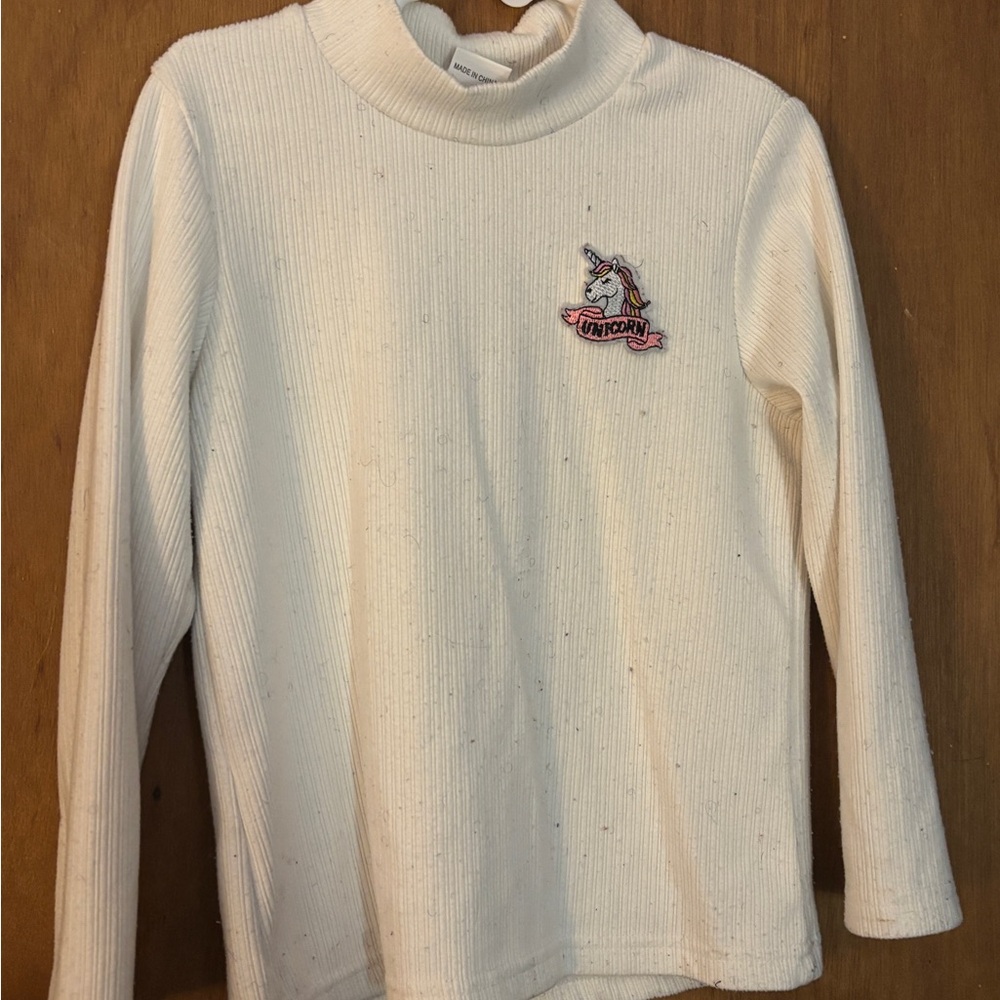 White Turtleneck with Unicorn Patch